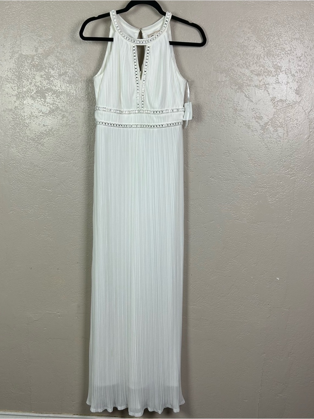 Elegantly Pleated White Maxi Dress with Beaded Trim It's a bit dirty.